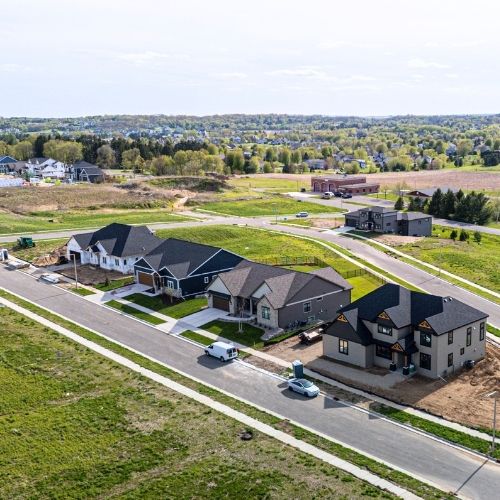 Four new construction homes on purchased Fox Knoll lots